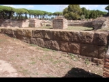 02555 ostia - regio ii - insula ix - grandi horrea (ii,ix,7) - westseite - via molini - tufa blocks - bli ri nordosten - 09-2022.jpg